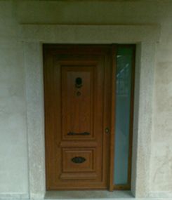 Carpintería de Aluminio PVC y Cristalería Peña puerta de madera